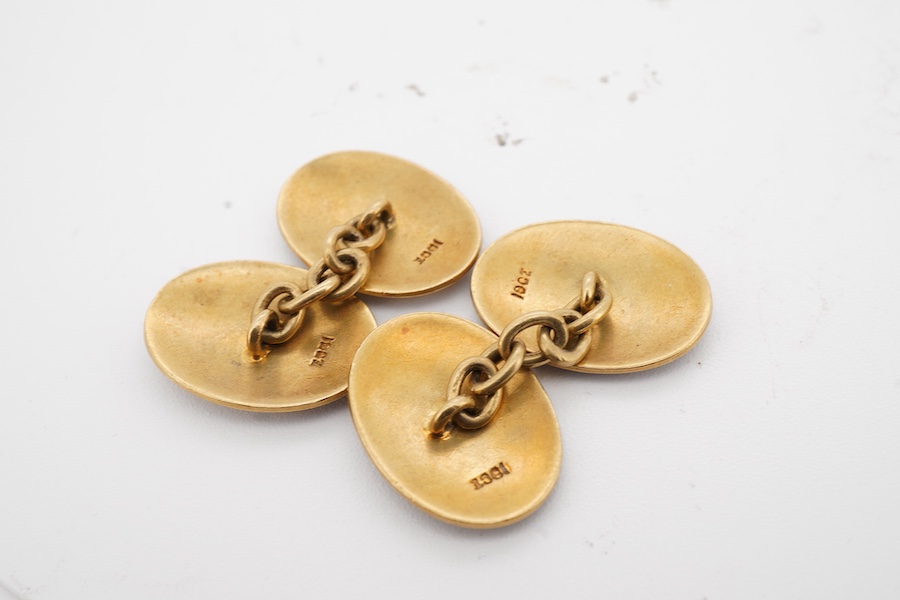 A pair of Edwardian gold and blue enamel chain link cufflinks, stamped 18ct, engraved with interlaced and surmounted by a Barons coronet, combined gross weight approximately 9.5 grams